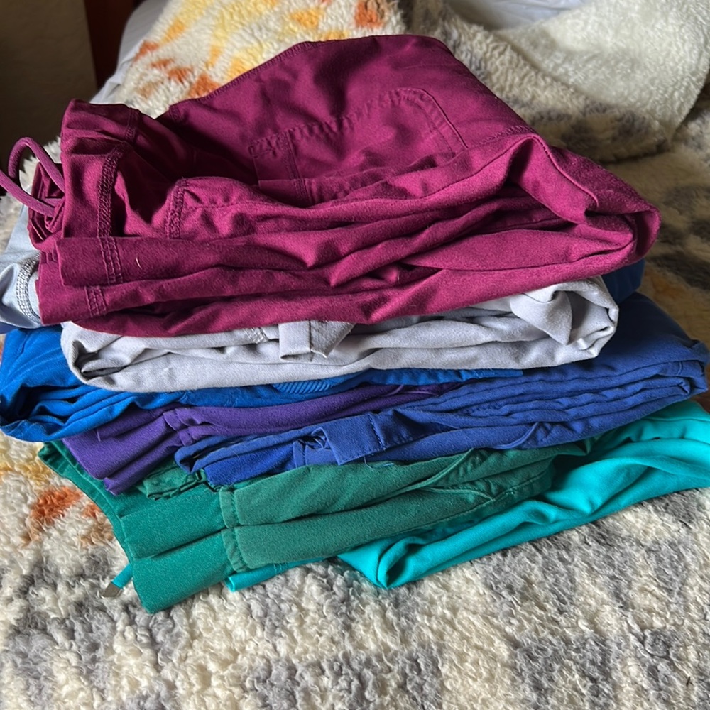 5 pairs of size small tall scrub pants, one size xs tall and one medium shirt